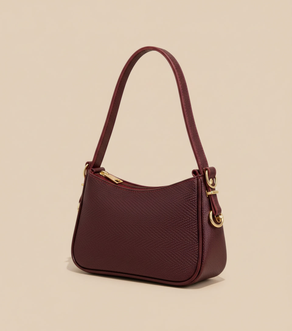 Wine textured shoulder bag with gold hardware and slim strap – Eliana Bag by Pinkish